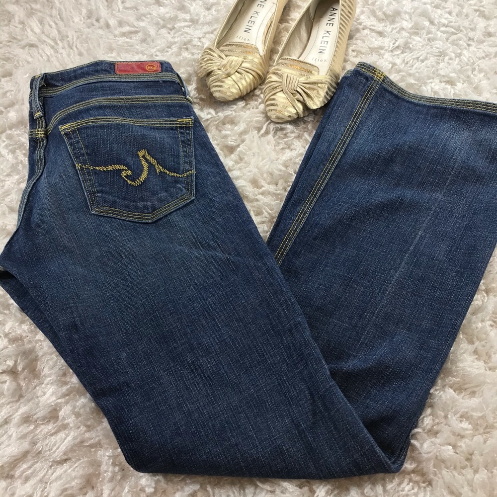 AG- THE MERLOT LOW RISE BOOT CUT JEANS